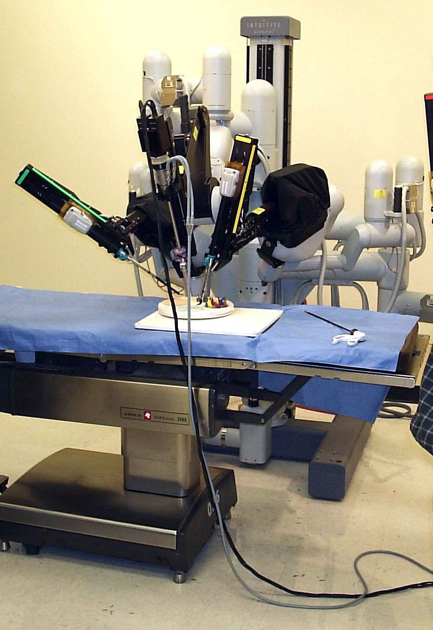 Da Vinci robotic surgical arms at the patient-side cart